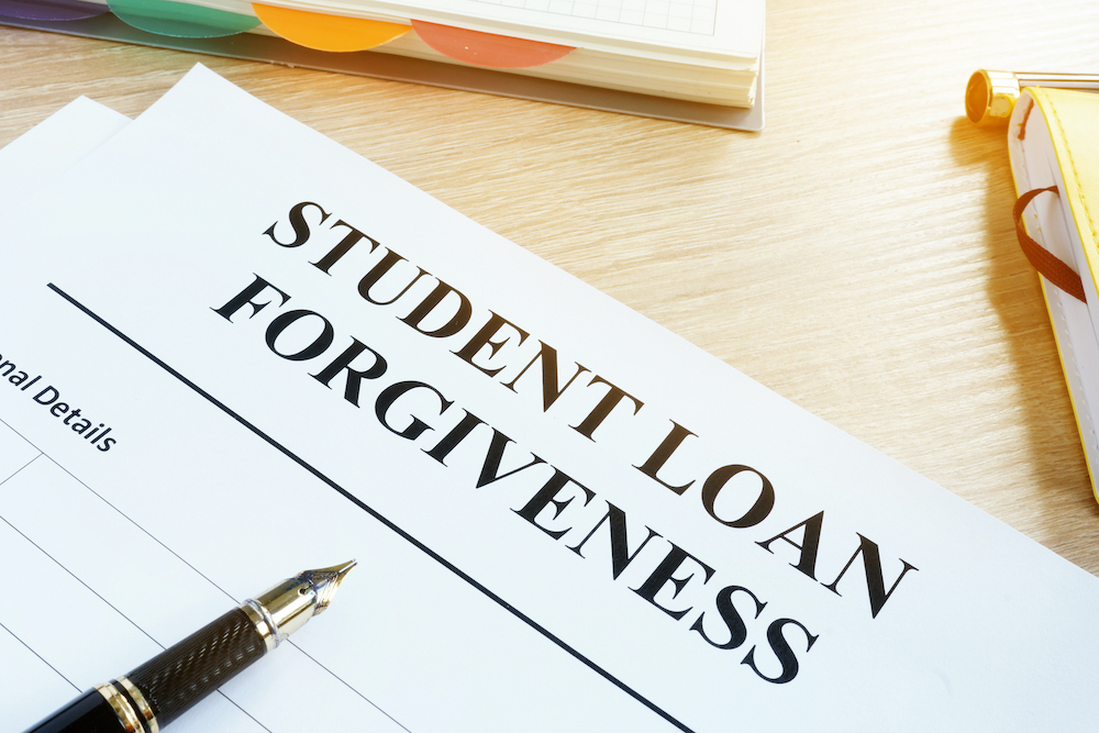 Student loan forgiveness form on a desk.